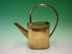Manner of Sir Christopher Dresser. A brass watering can, the base stamped R. Perry, Wolverhampton.