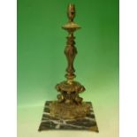 A Gilt Brass Table Lamp. Neo-classical form, raised on a marble base and paw feet. 17" high