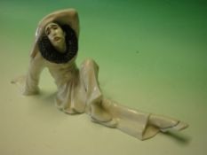 Heubach Porcelain. A figure of a pierrot, modelled by Wera Bartels. Incised under-glaze signature to