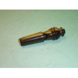 A Lignum Vitae Whistle with screw threaded top. 3" long