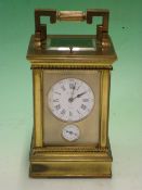 A French Gilt Brass Carriage Clock with alarm and repeat, the 8 day movement with platform lever