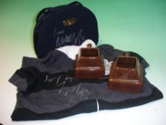 George Michael / Wham A collection of signed objects comprising a pair of Cadburys mugs, Christian
