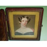 A Portrait Miniature - Young lady wearing a black dress. Leather diptych case. 19th century