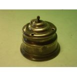 A Pewter Inkwell with domed lid and four quill apertures, lead weighted base. Early 19th century. 4"