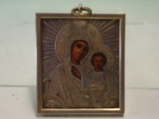 Russian Art. A white metal and enamel miniature icon, the Virgin and the Christ Child. 19th century.