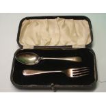 A Silver Christening Spoon and Fork. Cased. Sheffield 1939. 1oz 13dwts