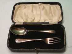 A Silver Christening Spoon and Fork. Cased. Sheffield 1939. 1oz 13dwts