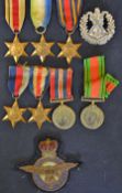 WWII Medals and Badges to consist of 1939-45 star France and Germany star, Burma star, Africa