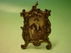 Bronze Photograph Frame of Rococo form with strut back. c1880. 7" high