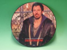Bruce Springsteen. A "Streets of Philadelphia" limited edition disc, signed by Springsteen, Neal