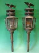A Pair of Brass Carriage Lamps each with an eagle surmount. 27" high