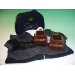 George Michael / Wham A collection of signed objects comprising a pair of Cadburys mugs, Christian