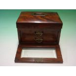 A Victorian Walnut Jewellery Case, the slightly domed lid over a glazed fall front enclosing a