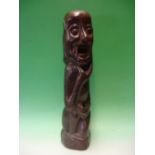 Ethnic Art. A hardwood figural carving. 24" high