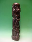 Ethnic Art. A hardwood figural carving. 24" high