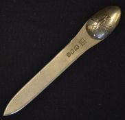 A silver golfing letter opener - the oval terminal with relief decoration of a Vic golfer at the top