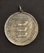 1893 Seaford Golf Club white metal golf medal - the obverse embossed with the club's crest and on