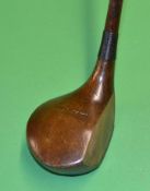 Interesting oval shafted A M Duncan Tredegar socket head brassie - with full length thick leather