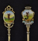 2x silver and enamel golfing teaspoons c1920s - with finely painted enamel shield terminals, one for
