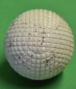 Original c1900 line mesh pattern rubber core golf ball - retaining 95% white paint finish but has