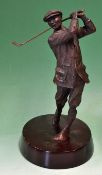 Large solid bronze figure of a Victorian golfer in the style of Harry Vardon - mounted on an oval