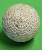 The Colonel bramble pattern rubber core golf ball showing the name to one pole and the patent number