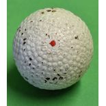 The Hopper bramble patent gutty golf ball retaining most of its original white paint, with a central