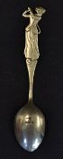 Lady Margaret Scott - a silver golfing teaspoon c1910 - the handle finely cast as the figure of Lady