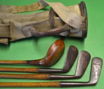 Good matching set of juvenile clubs including A Hunter light stained persimmon driver, and 3x C.M.