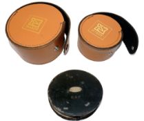 REEL CASES & CAST DAMPER: (3) Pair of Hardy classic leather fly reel cases, external diameters 4.25"