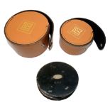 REEL CASES & CAST DAMPER: (3) Pair of Hardy classic leather fly reel cases, external diameters 4.25"
