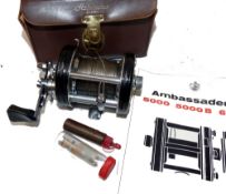 REEL: Abu Ambassadeur 6000 C multiplier reel in fine condition, black grooved end plates, 3 screw