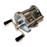 REEL: Hardy Elarex bait casting multiplier reel, level wind, brake and check adjusters, twin black