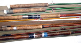 RODS: (5) Martinez & Bird 8' 2 piece split cane spinning rod, bronze ferrule, cork handle with alloy