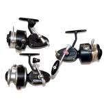 REELS: (3) Collection of spinning reels incl. rare Garcia Mitchell 810 high speed model, bronze