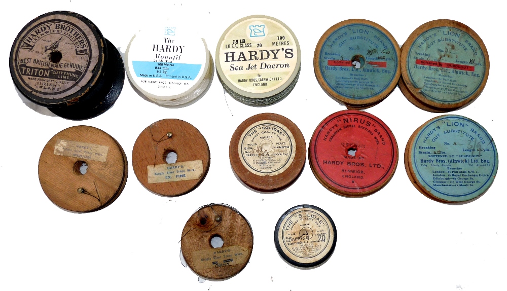 LINE SPOOLS: (12) Twelve assorted Hardy line spools, 10 x wood, 2 x plastic, examples incl. Lion