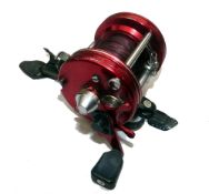 REEL: Abu Ambassadeur 6000 red multiplier reel, 3 screw end plate, grooved rims, level wind, 90%