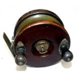 REEL: Milward's 4" mahogany and brass star back reel with brass Patent Brake nut adjuster, twin