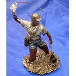 BRONZE FIGURE: Cast bronze figure of an angler netting a fish by Veronese 2004, impressed to rear