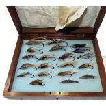 FLIES: Collection of 20 gut eyed salmon flies on black single hooks, up to 2.25" long, various