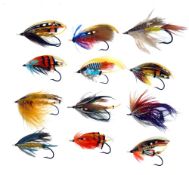 SALMON FLIES: (12) Collection of 12 traditional classic gut eye salmon flies tied by Eddy Cublin,