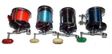 REELS: (4) Four Penn multiplier sea reels, 2 x Squidder wide drum beach reels with quick release end