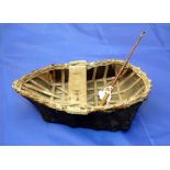 CORACLE: Miniature canvass tar covered coracle on wicker frame, built to replicate and original,