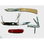 KNIVES: (4) Collection of four angler's knives, a Carl Schlieper forged knife by Solingen Germany, a