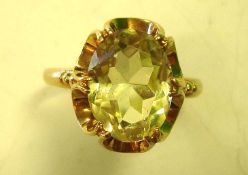 A Citrine Dress Ring The large stone in an openwork setting. In gold marked 375. Condition report: