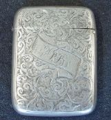 A Silver Vesta Case Engraved with foliage and a cartouche with initials ARB. 2" high. Birmingham