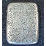 A Silver Vesta Case Engraved with foliage and a cartouche with initials ARB. 2" high. Birmingham