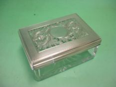 An Early Victorian Glass Trinket box. The silver cover engine turned and finely pierced with