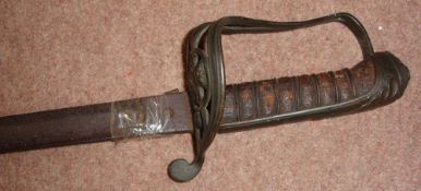 A Victorian Sword Length of blade 32 ½". Condition report: Losses to the wood grip, Hinged guard
