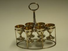 A George 111 Silver Egg Cruet By Henry Chawner. The oval form open work frame with reeded and